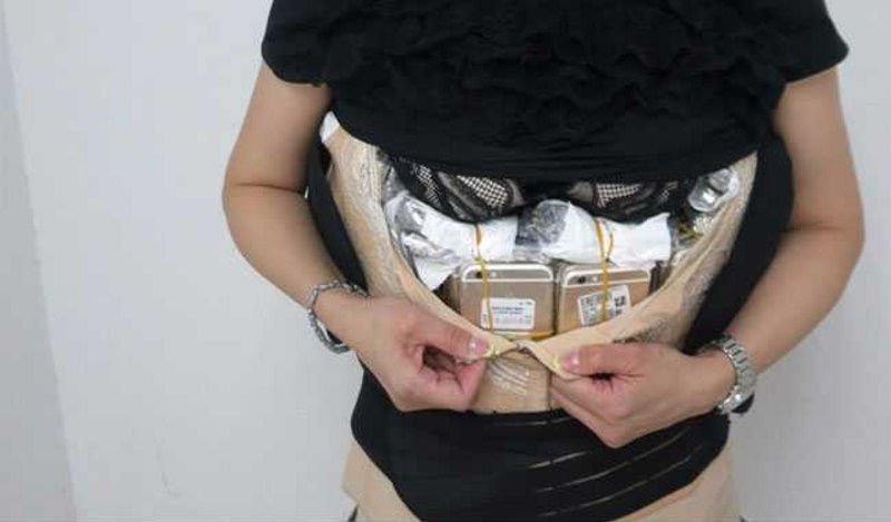 Woman arrested for smuggling 102 iPhones, 15 Watches to China