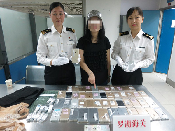 Woman arrested for smuggling 102 iPhones, 15 Watches to China