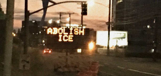 Traffic sign near ICE headquarters hacked with "Abolish ICE" message